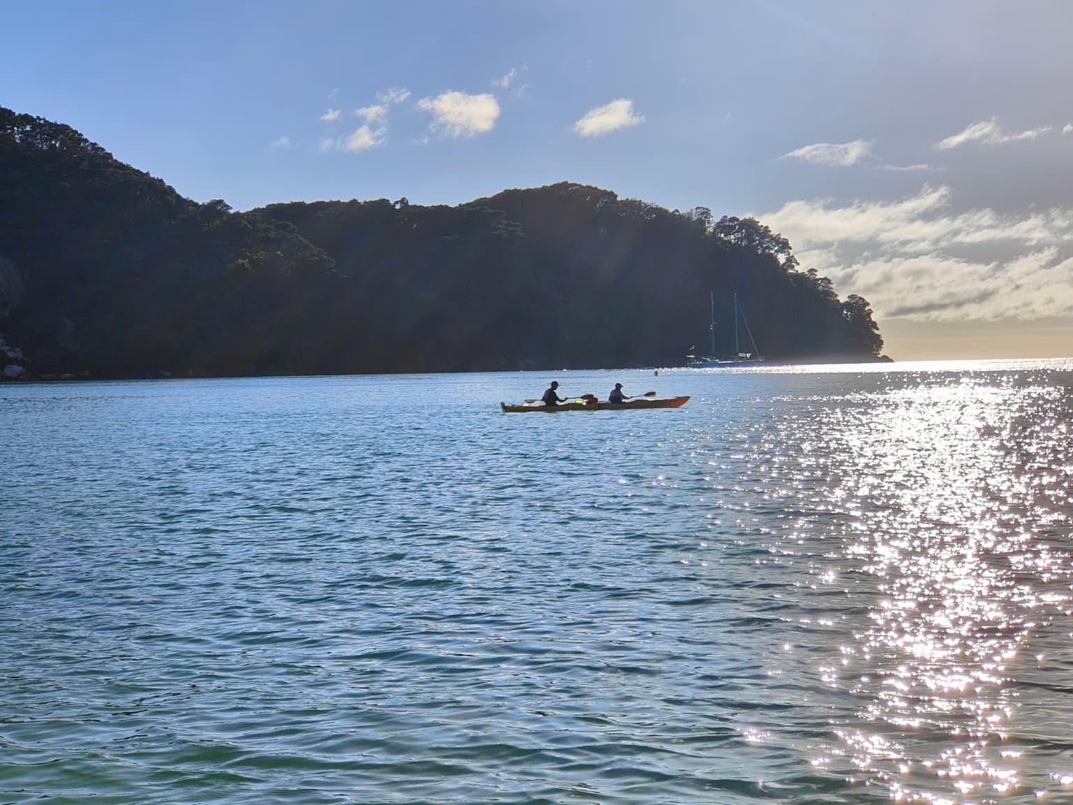 We did not kayak; we watched others cross the bright water from the track.