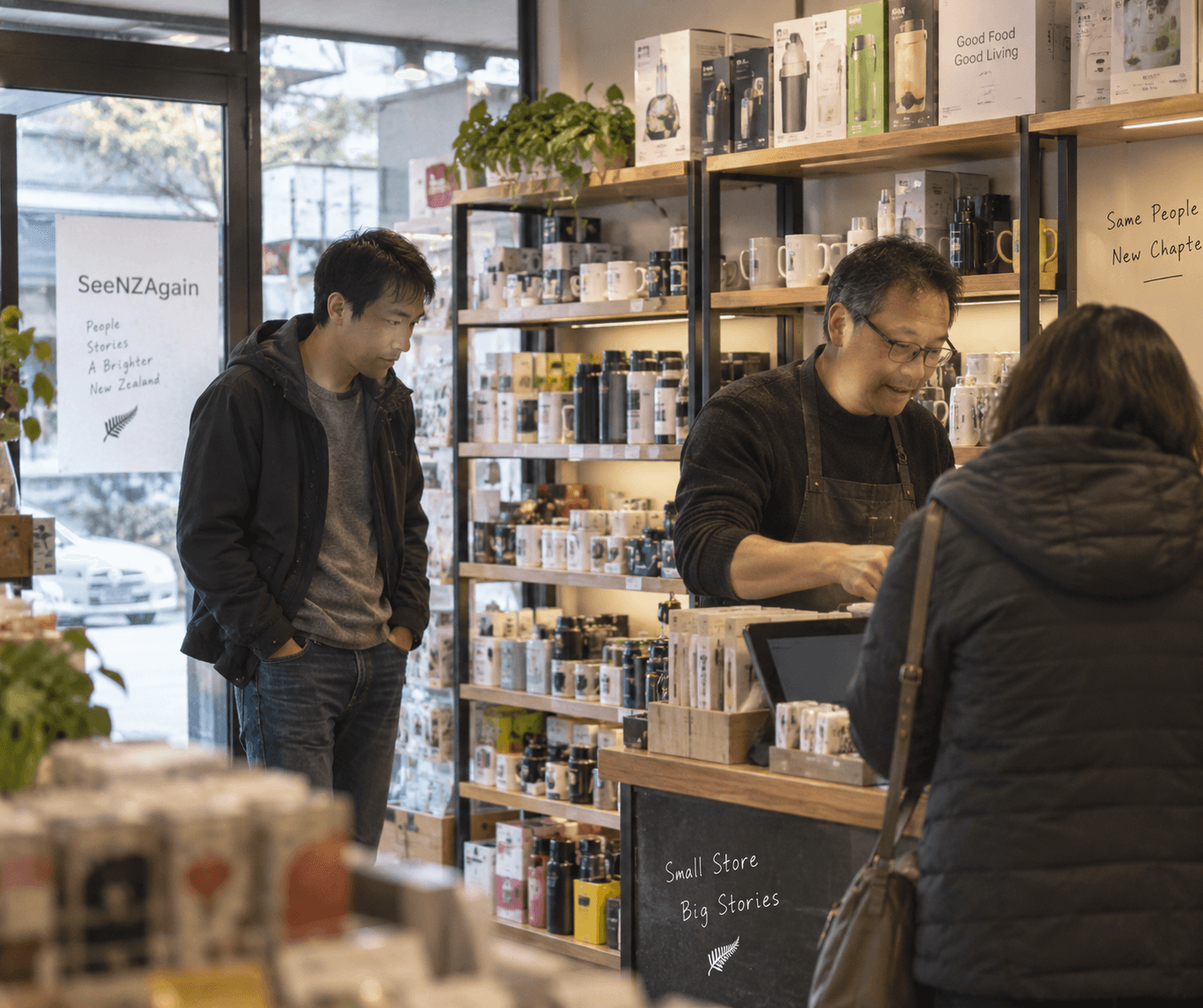 Literary illustration: David returns to the shop where he once worked while I serve a customer and he waits to one side.